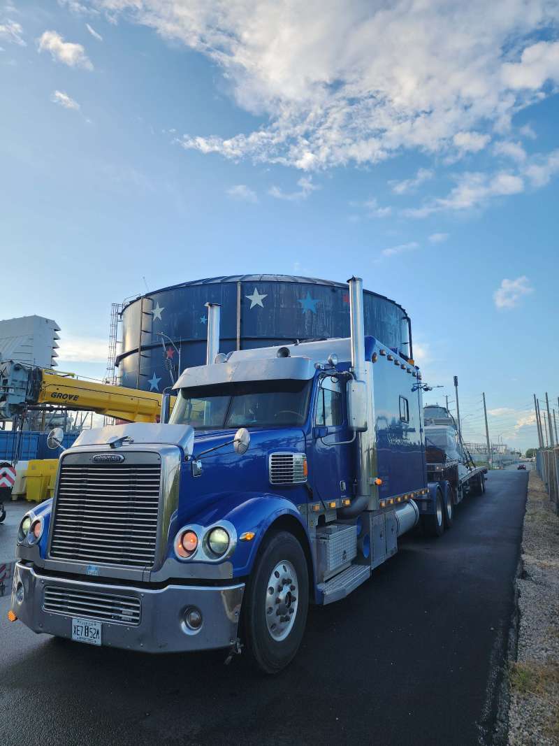 Emergency equipment delivered on stepdeck trailer in South Florida by M Taylor Inc